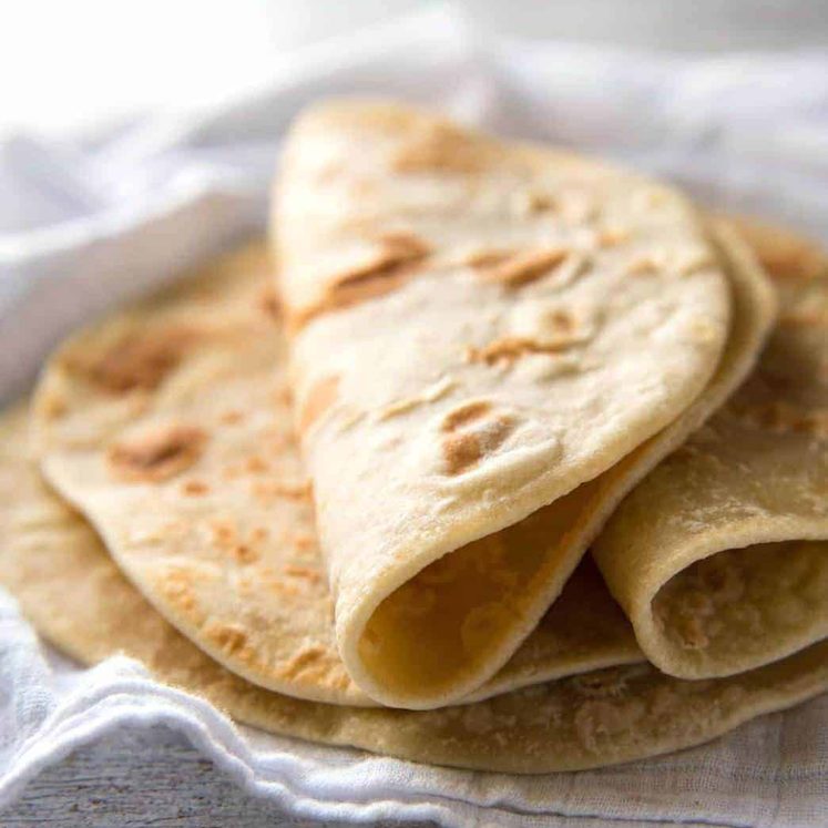 This flatbread recipe is made without yeast, yet is soft and pliable and wonderfully moist. staging.recipetineats.com