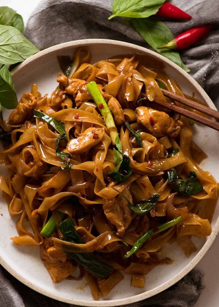 Overhead photo of Thai Drunken Noodles on a plate, ready to be eaten