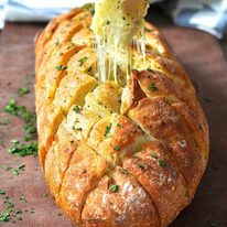 Cheese and garlic crack bread - this cheesy garlic bread is outta this world! staging.recipetineats.com