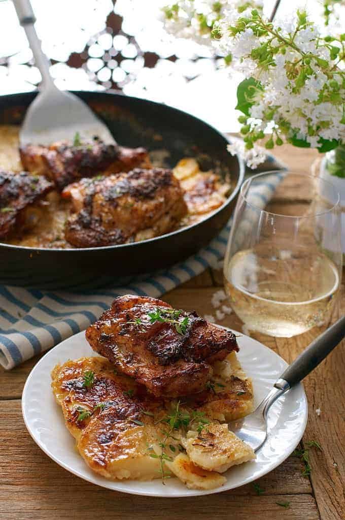 A serving of Rotisserie Flavoured Chicken and Potato Bake on a white plate
