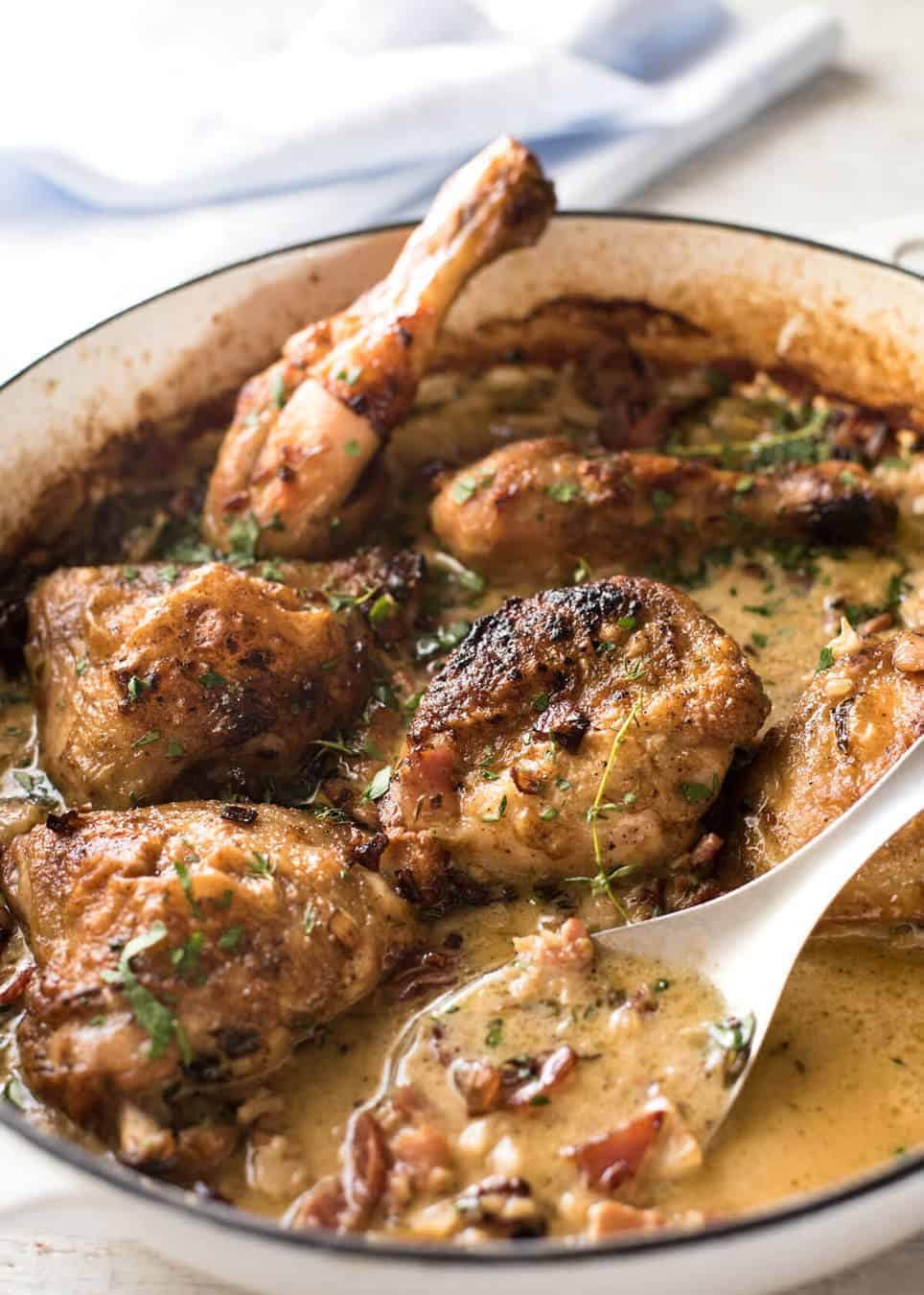 Chicken with Creamy White Wine Sauce and Bacon - So easy to prepare, then just let it braise in the oven until the chicken is tender. The sauce is incredible! staging.recipetineats.com