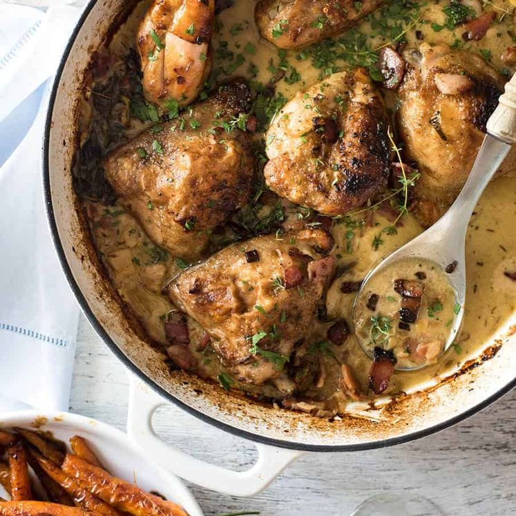 Chicken with Creamy White Wine Sauce and Bacon - So easy to prepare, then just let it braise in the oven until the chicken is tender. The sauce is incredible! staging.recipetineats.com