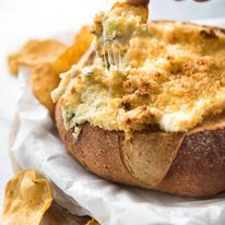 It's a Jalape&ntilde;o Popper - in dip form! A warm creamy dip spiked with jalape&ntilde;o, topped with a crunchy panko topping! staging.recipetineats.com