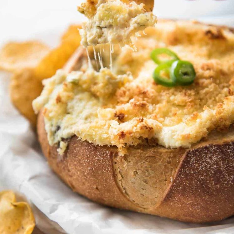 It's a Jalape&ntilde;o Popper - in dip form! A warm creamy dip spiked with jalape&ntilde;o, topped with a crunchy panko topping! staging.recipetineats.com