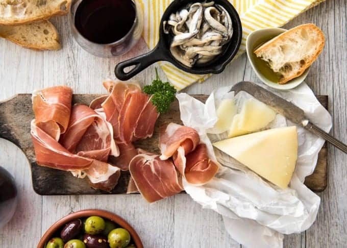 5 Easy Spanish Tapas recipes - all your favorites from the tapas bar! Garlic mushrooms, chorizo, garlic shrimp/prawns, Spanish marinated olives , Spanish omelette and a cheese platter! staging.recipetineats.com