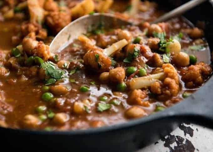 This Cauliflower and Chickpea Curry is an authentic Indian homestyle recipe that's healthy and made with everyday ingredients! staging.recipetineats.com