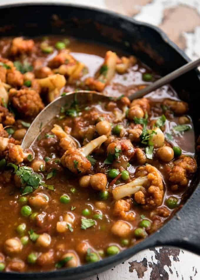 This Cauliflower and Chickpea Curry is an authentic Indian homestyle recipe that's healthy and made with everyday ingredients! staging.recipetineats.com