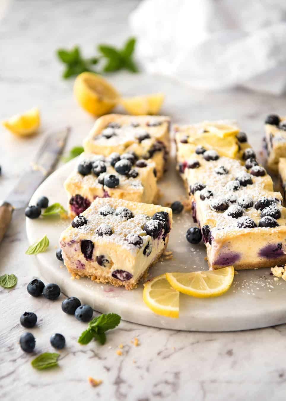 These Blueberry Cheesecake Bars are light yet creamy and luscious. Filled with soft blueberries, this is a baked cheesecake that's so easy to make! staging.recipetineats.com