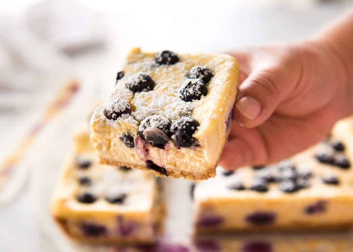 These Blueberry Cheesecake Bars are light yet creamy and luscious. Filled with soft blueberries, this is a baked cheesecake that's so easy to make! staging.recipetineats.com