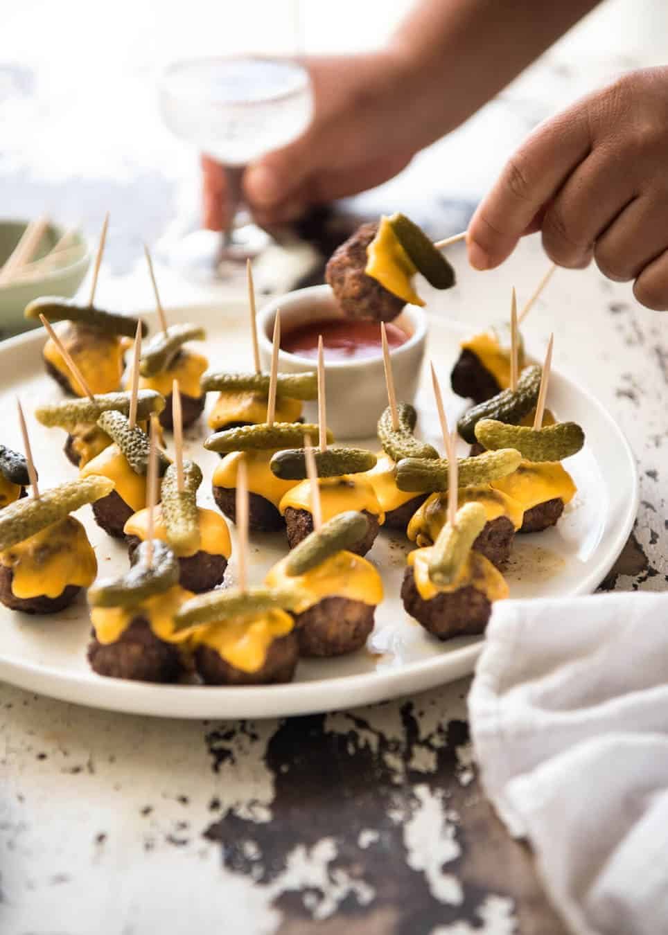 Cheeseburger Party Meatballs - tastes like a cheeseburger, in bite size form! Great for making ahead - fully assemble (inc toothpicks), 90 sec reheat in microwave. staging.recipetineats.com