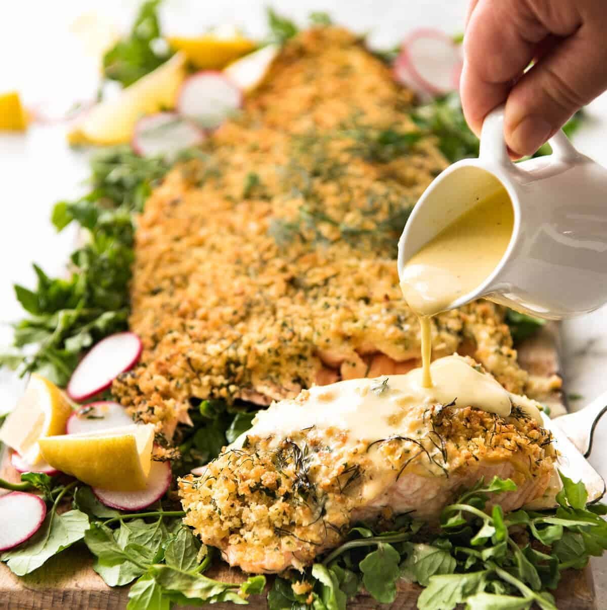 Baked Parmesan Crusted Salmon with Lemon Cream Sauce - easy and fast to make, can be prepared ahead, a stunning centrepiece for Christmas dinner and yet easy enough for midweek. That Lemon Cream sauce is the perfectly finishing tough. staging.recipetineats.com