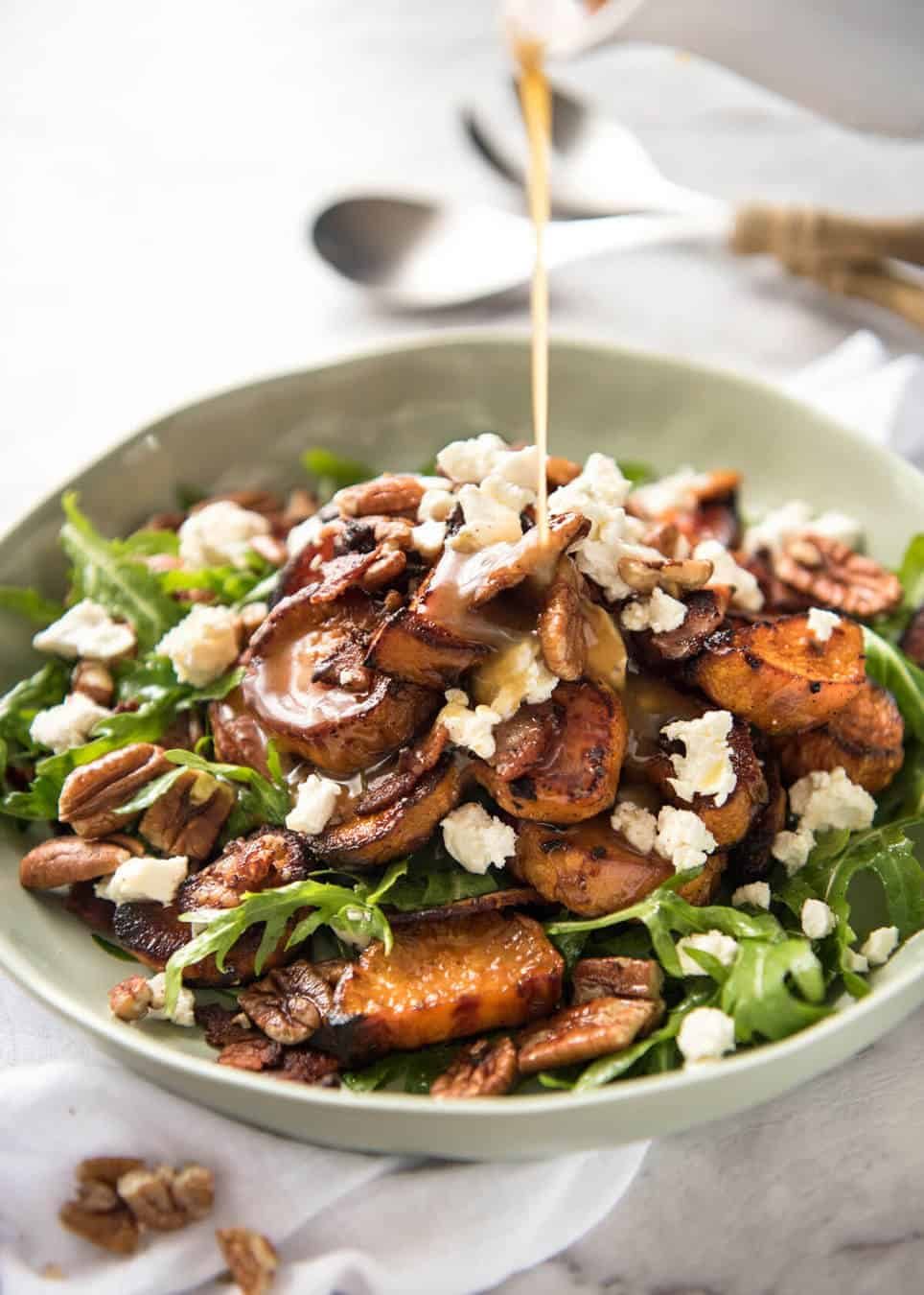 Roasted Sweet Potato Salad - with arugula/rocket, pecans, goats cheese or feta, a sprinkle of bacon and a beautiful Honey Lemon dressing. staging.recipetineats.com