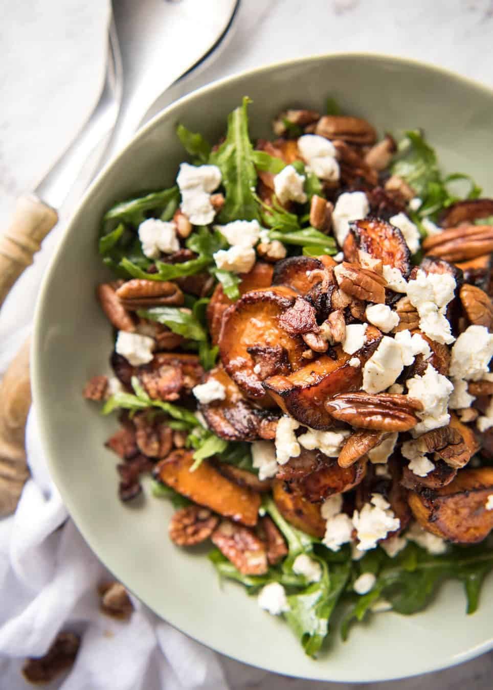 Roasted Sweet Potato Salad - with arugula/rocket, pecans, goats cheese or feta, a sprinkle of bacon and a beautiful Honey Lemon dressing. staging.recipetineats.com