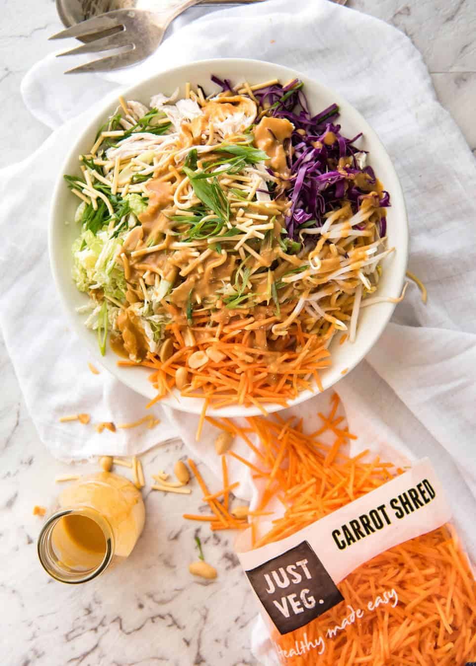 Chinese Chicken Salad with Asian Peanut Salad Dressing - made with cabbage, shredded chicken, crunchy noodles, carrot and a killer peanut dressing! staging.recipetineats.com