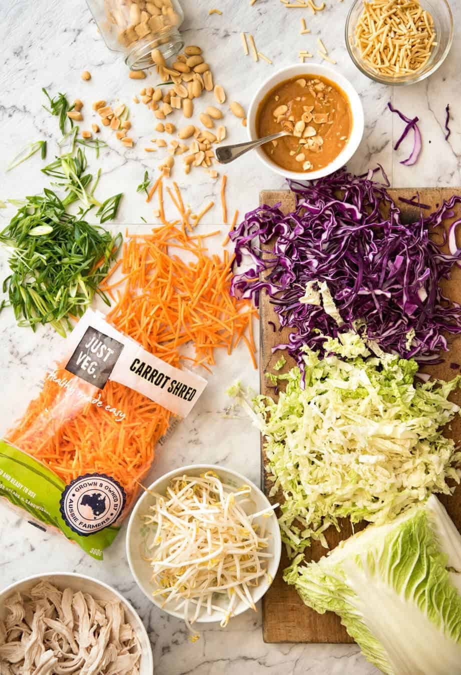 Chinese Chicken Salad with Asian Peanut Salad Dressing - made with cabbage, shredded chicken, crunchy noodles, carrot and a killer peanut dressing! staging.recipetineats.com