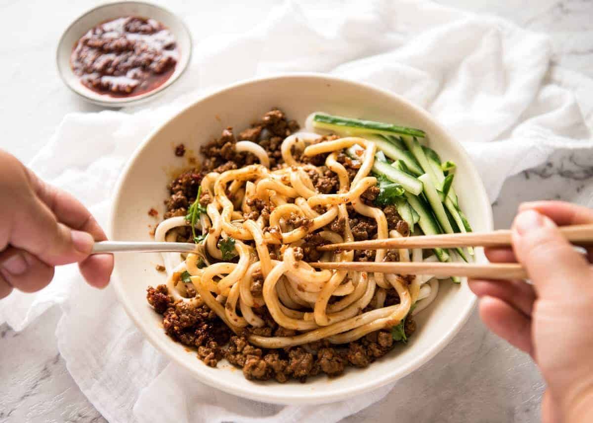 Chinese Pork with Noodles (Zha Jiang Mian) - Super quick and super tasty, affectionally known as "Chinese Bolognese". The pork is savoury with a touch of heat and spice, perfect mixed through noodles! staging.recipetineats.com