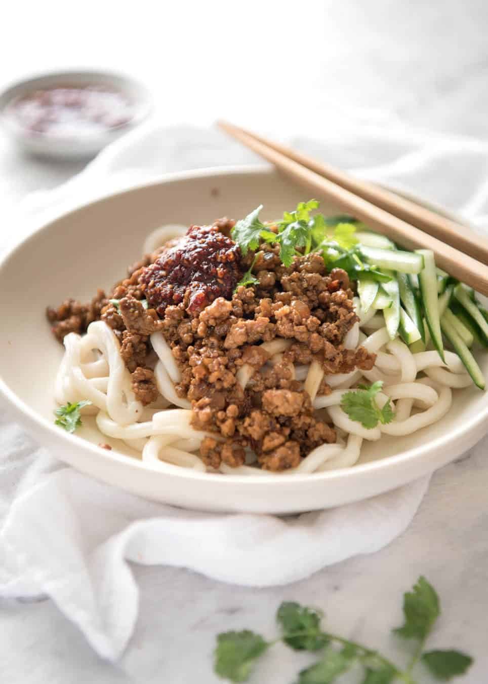 Chinese Pork with Noodles (Zha Jiang Mian) - Super quick and super tasty, affectionally known as "Chinese Bolognese". The pork is savoury with a touch of heat and spice, perfect mixed through noodles! staging.recipetineats.com