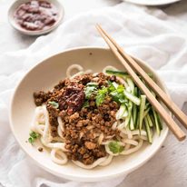 Chinese Pork with Noodles (Zha Jiang Mian) - Super quick and super tasty, affectionally known as "Chinese Bolognese". The pork is savoury with a touch of heat and spice, perfect mixed through noodles! staging.recipetineats.com