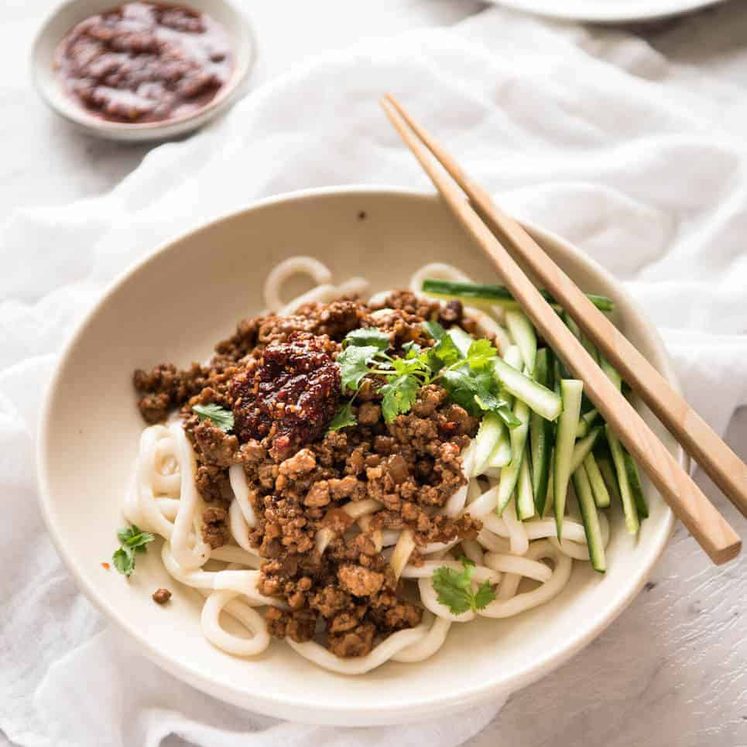 Chinese Pork with Noodles (Zha Jiang Mian) - Super quick and super tasty, affectionally known as "Chinese Bolognese". The pork is savoury with a touch of heat and spice, perfect mixed through noodles! staging.recipetineats.com