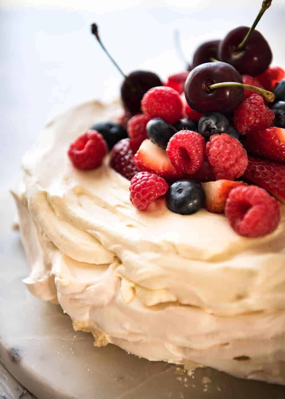 Classic Pavlova recipe with easy to follow tips that make all the difference for a perfect Pav, every time! staging.recipetineats.com