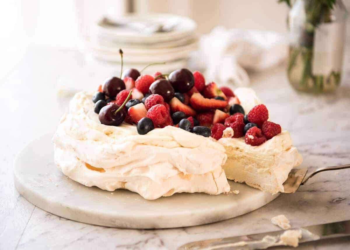 Classic Pavlova recipe with easy to follow tips that make all the difference for a perfect Pav, every time! staging.recipetineats.com