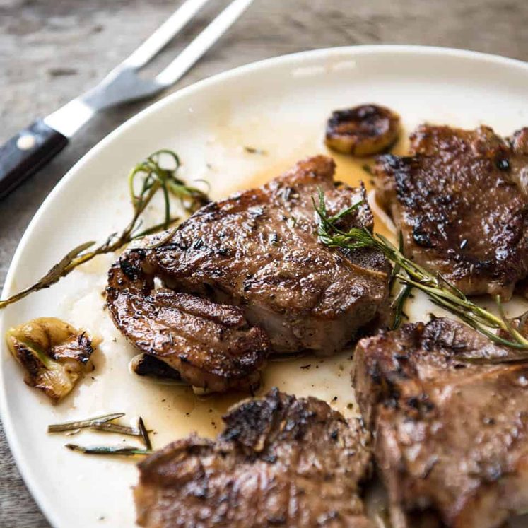 Rosemary Garlic Grilled Lamb Chops - A simple marinade infuses this with fantastic flavour! Use the marinade for any quick-cooking cut of lamb - chops or steaks. staging.recipetineats.com