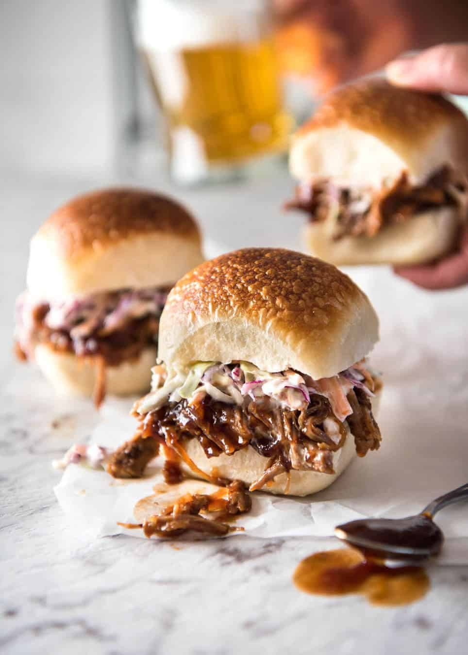 Slow Cooker BBQ Pulled Pork Sandwich - Perfectly seasoned, tender pulled pork tossed in a homemade BBQ sauce, piled onto bread with coleslaw. Slow cooker, pressure cooker or oven. staging.recipetineats.com