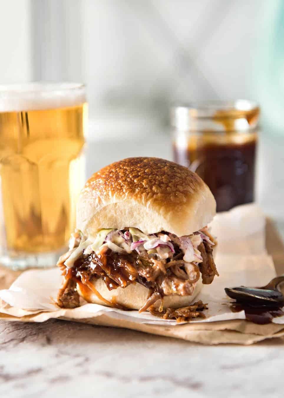 Slow Cooker BBQ Pulled Pork Sandwich - Perfectly seasoned, tender pulled pork tossed in a homemade BBQ sauce, piled onto bread with coleslaw. Slow cooker, pressure cooker or oven. staging.recipetineats.com