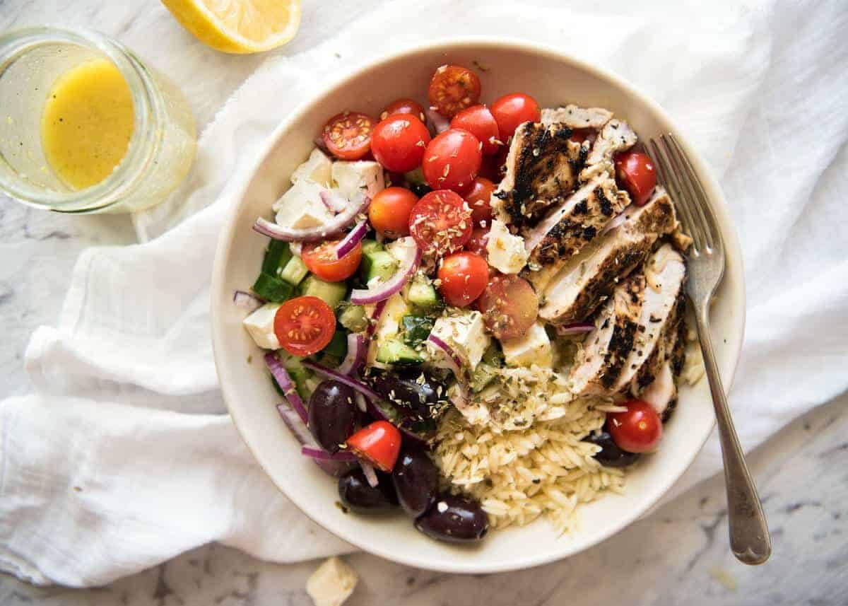 Greek Lemon Orzo Salad (Risoni) - All the fixings of a Greek Salad tossed through orzo / risoni and dressed with a gorgeous zesty lemon vinaigrette. staging.recipetineats.com