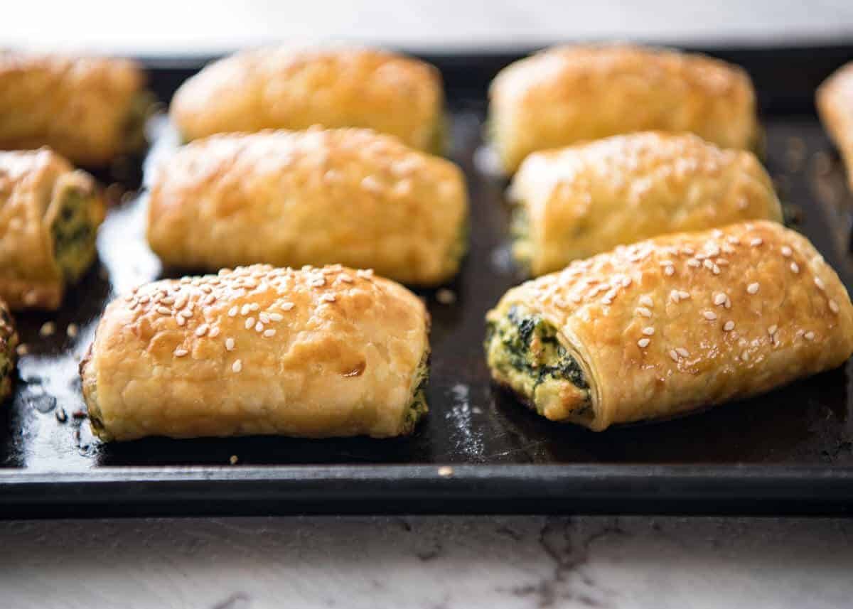 Spinach and Ricotta Rolls - a moist cheesy filling enclosed with buttery flaky puff pastry. Great make ahead for freezing! staging.recipetineats.com