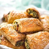 Spinach and Ricotta Rolls - a moist cheesy filling enclosed with buttery flaky puff pastry. Great make ahead for freezing! staging.recipetineats.com