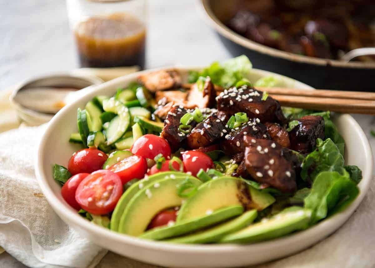 Asian Salmon Salad - Salmon dripping in a gorgeous Asian glaze on a fresh, vibrant salad drizzled with sesame dressing. Quick to make, packed with serious flavour! staging.recipetineats.com