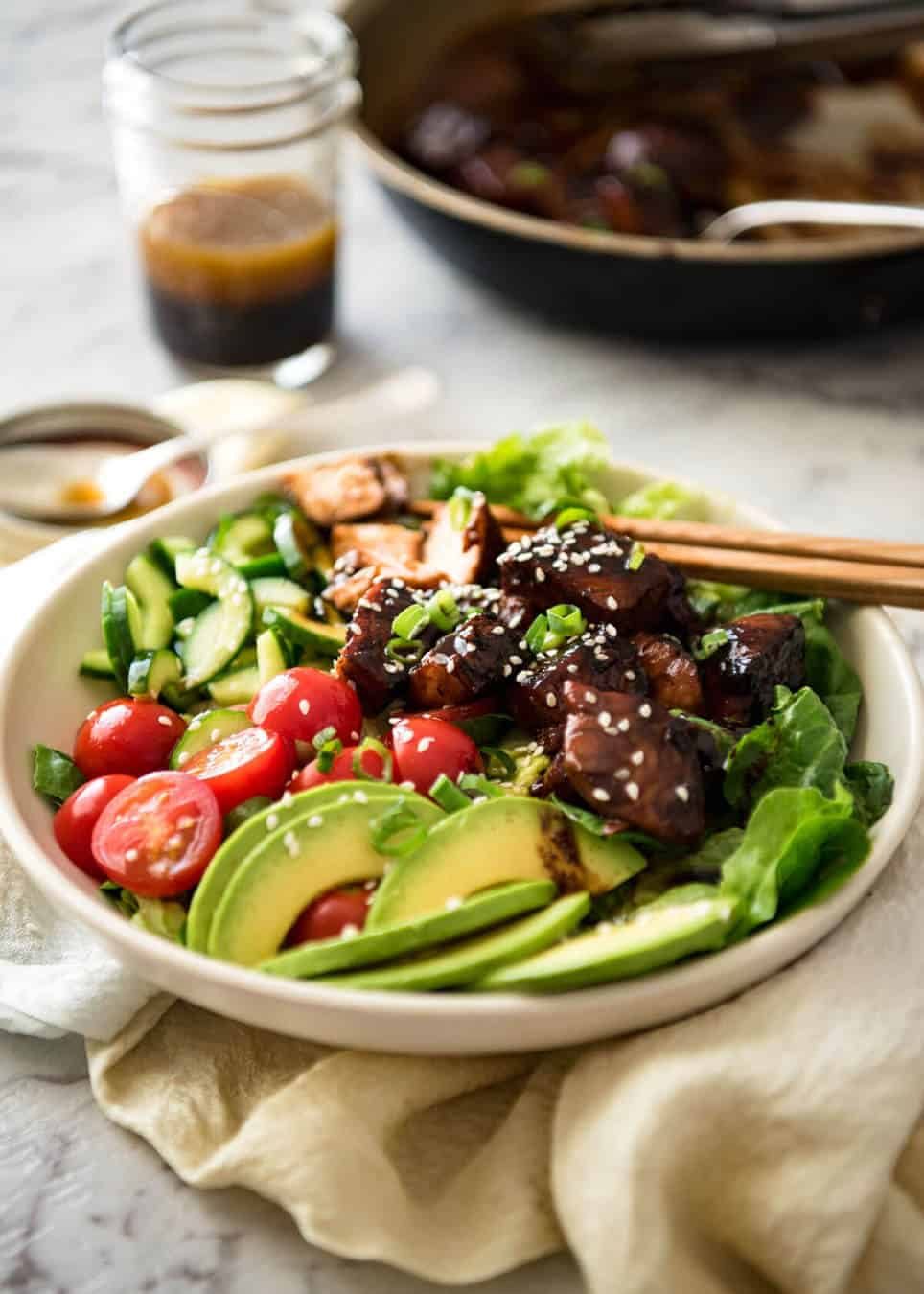 Asian Salmon Salad - Salmon dripping in a gorgeous Asian glaze on a fresh, vibrant salad drizzled with sesame dressing. Quick to make, packed with serious flavour! staging.recipetineats.com