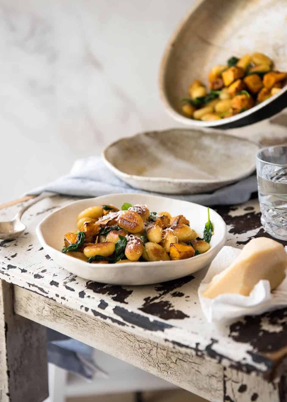 Pan Fried Gnocchi with Pumpkin and Spinach - Golden crispy on the outside, soft on the inside, with a butter sage sauce, roasted pumpkin and spinach. staging.recipetineats.com