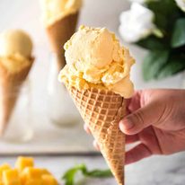 Homemade Mango Ice Cream recipe - Made without an ice cream maker, all you need is mangoes, condensed milk and cream to make this Mango Ice Cream recipe that is truly creamy and scooopable. The real mango flavour is incredible! staging.recipetineats.com