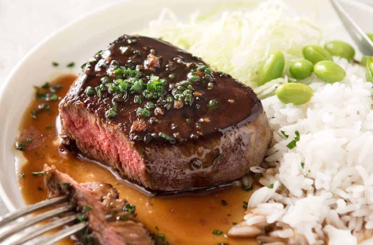 Simple yet stunning Asian Steak with a sauce inspired by the great Tetsuya! All you need is 15 minutes, soy sauce, mirin, sake or sherry, butter, garlic and ginger. Amazing! staging.recipetineats.com