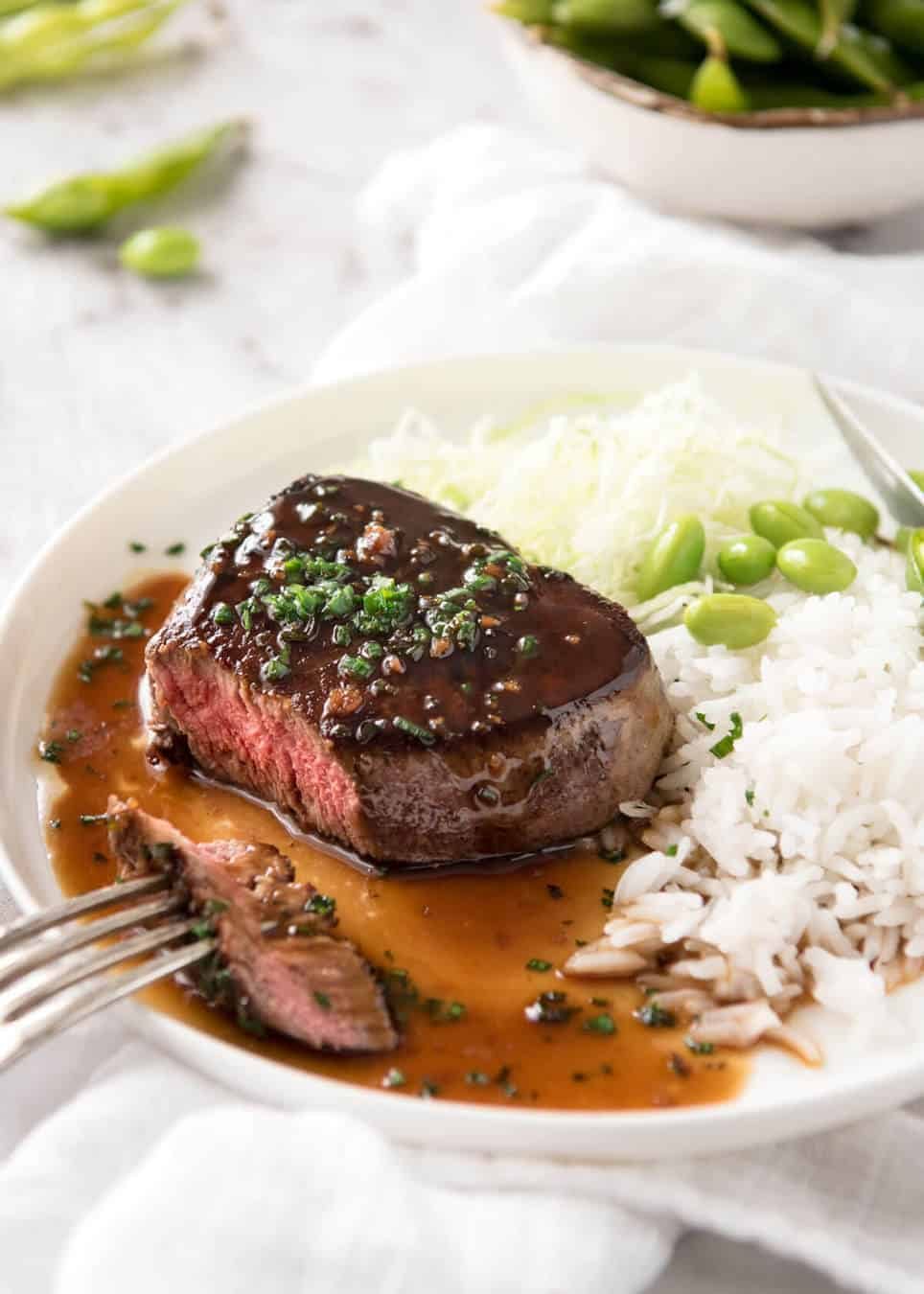 Simple yet stunning Asian Steak with a sauce inspired by the great Tetsuya! All you need is 15 minutes, soy sauce, mirin, sake or sherry, butter, garlic and ginger. Amazing! staging.recipetineats.com