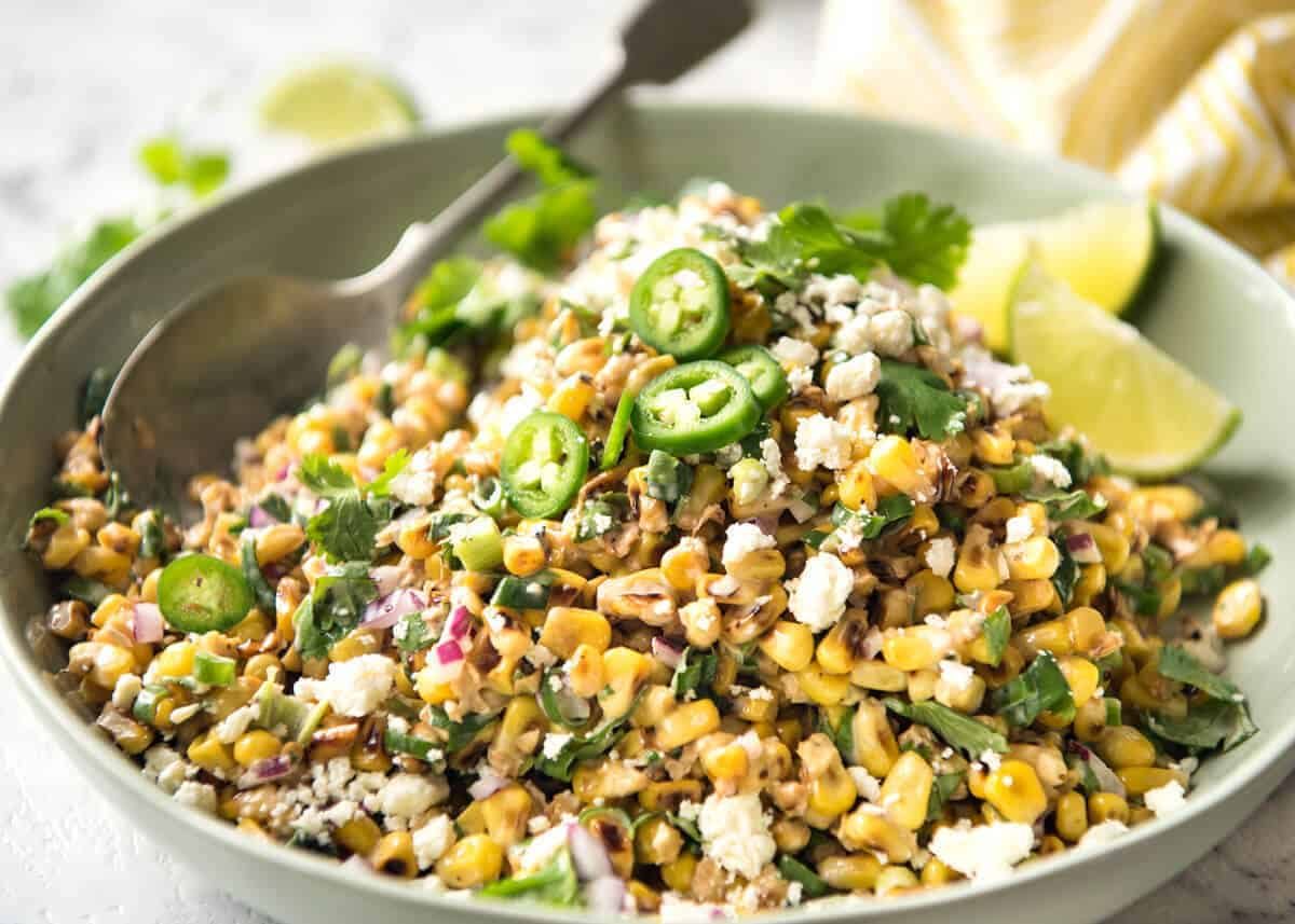 Mexican Corn Salad - Inspired by the famous Mexican street corn, this is a terrific way to use corn for an irresistible side! staging.recipetineats.com
