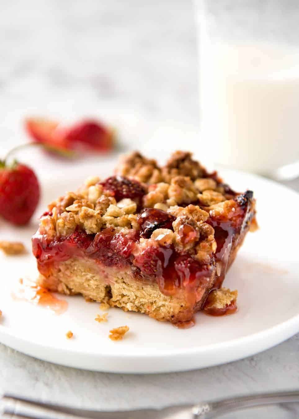 Fresh Strawberry Bars with a buttery biscuit base, topped with jam, fresh strawberries and a crumbly topping. No mixer, quick to make! staging.recipetineats.com