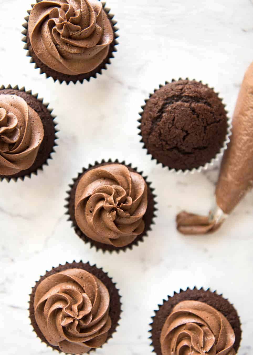 No stand mixer required to make the Best EASY Chocolate Cupcakes. Moist, deeply chocolatey with a tender crumb, these are unbelievably fast & easy. staging.recipetineats.com