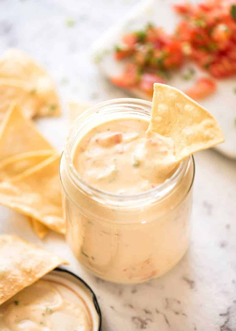 Code cracked: Queso Dip made with real cheese that's ultra silky even when it cools. staging.recipetineats.com