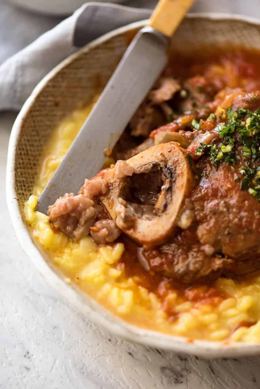 Fork tender veal braised in a rich red sauce, Osso Buco is a meal fit for a king! staging.recipetineats.com