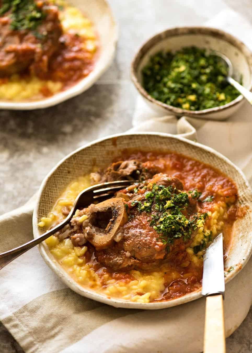 Fork tender veal braised in a rich red sauce, Osso Buco is a meal fit for a king! staging.recipetineats.com