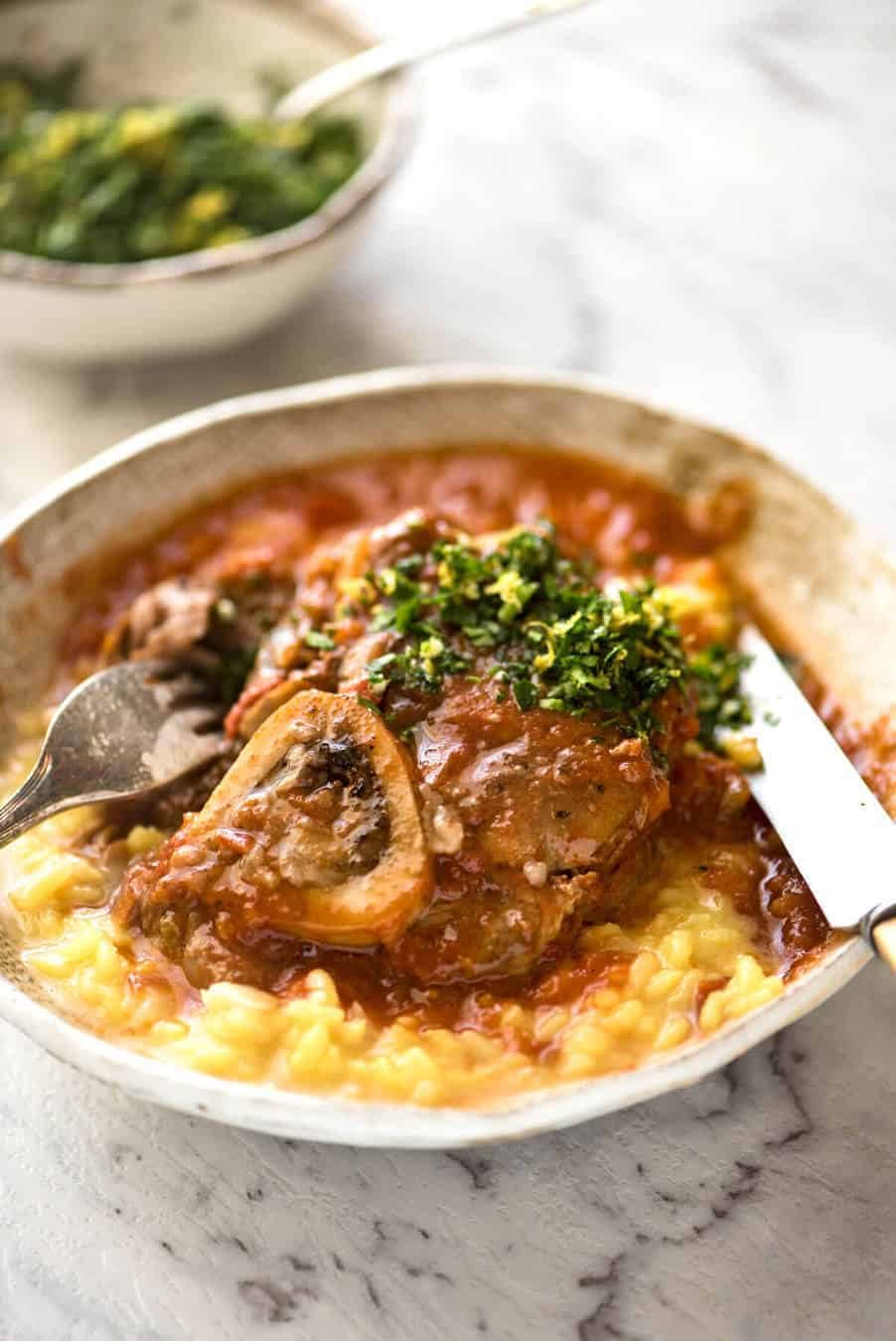 Fork tender veal braised in a rich red sauce, Osso Buco is a meal fit for a king! staging.recipetineats.com