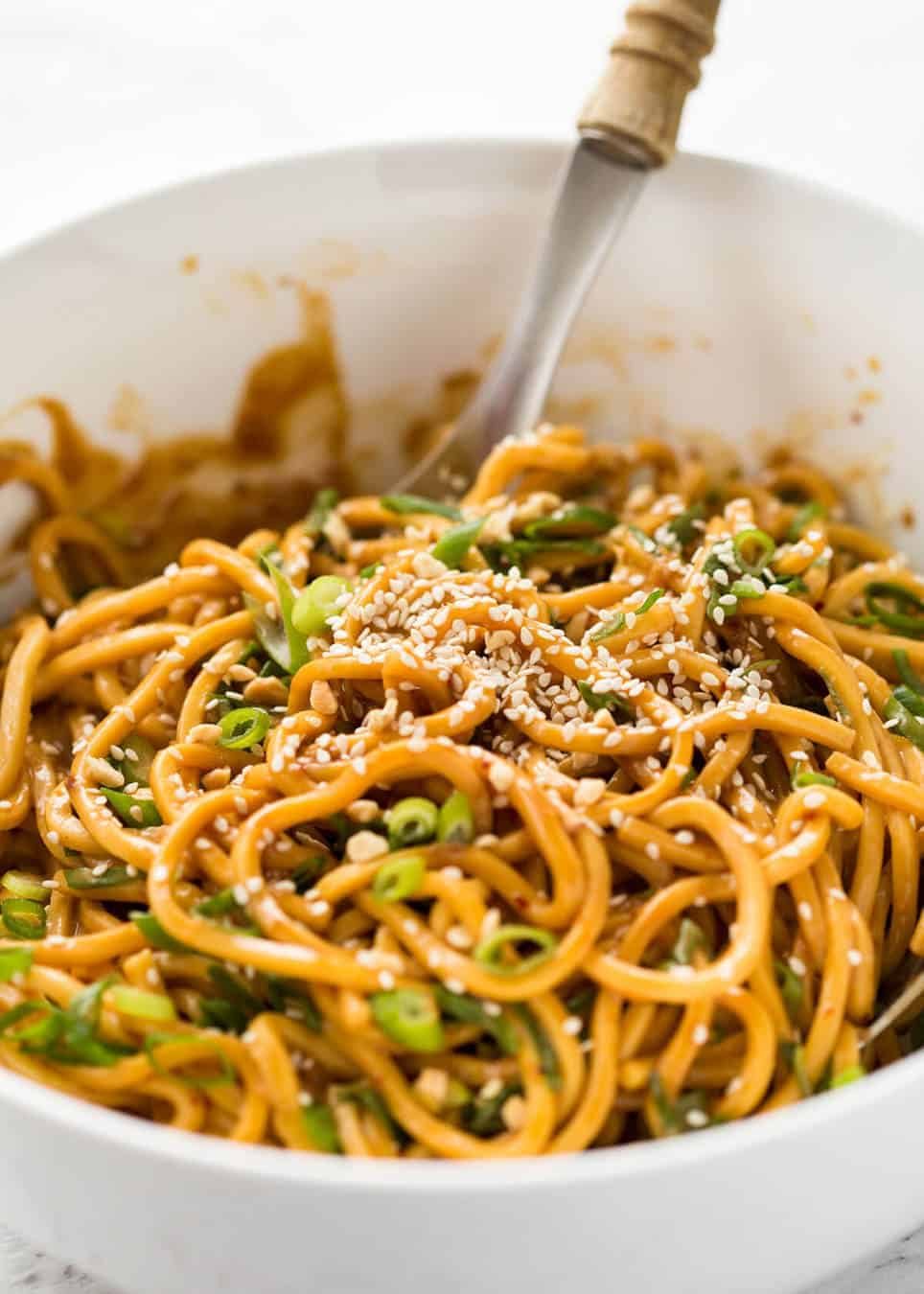 Sesame Noodles - noodles tossed with a wicked Asian Sesame Peanut Dressing. Serve these as Cold Sesame Noodles or warm. staging.recipetineats.com