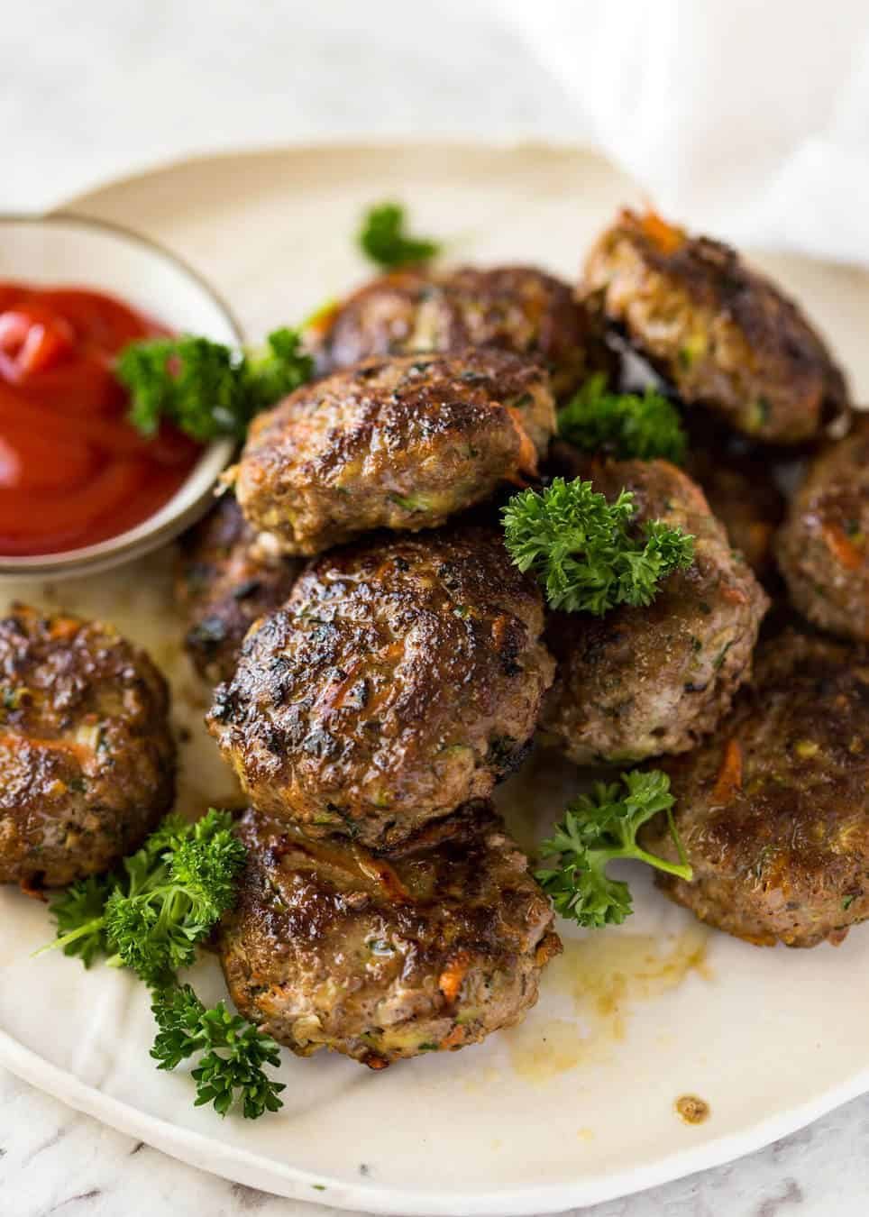 This is how to make plump, juicy, extra tasty rissoles with hidden veggies! staging.recipetineats.com