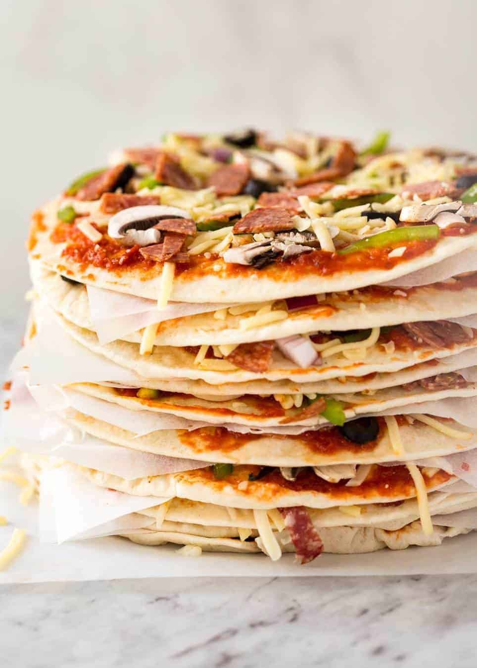 $2 Homemade Frozen Pizzas - quick and easy made using flatbreads, cook from frozen for a terrific Thin & Crispy pizza! staging.recipetineats.com