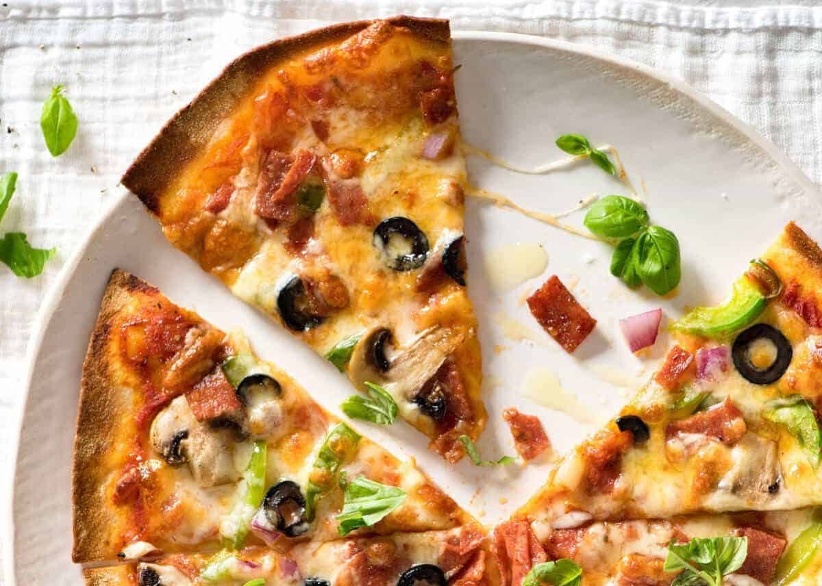$2 Homemade Frozen Pizzas - quick and easy made using flatbreads, cook from frozen for a terrific Thin & Crispy pizza! staging.recipetineats.com