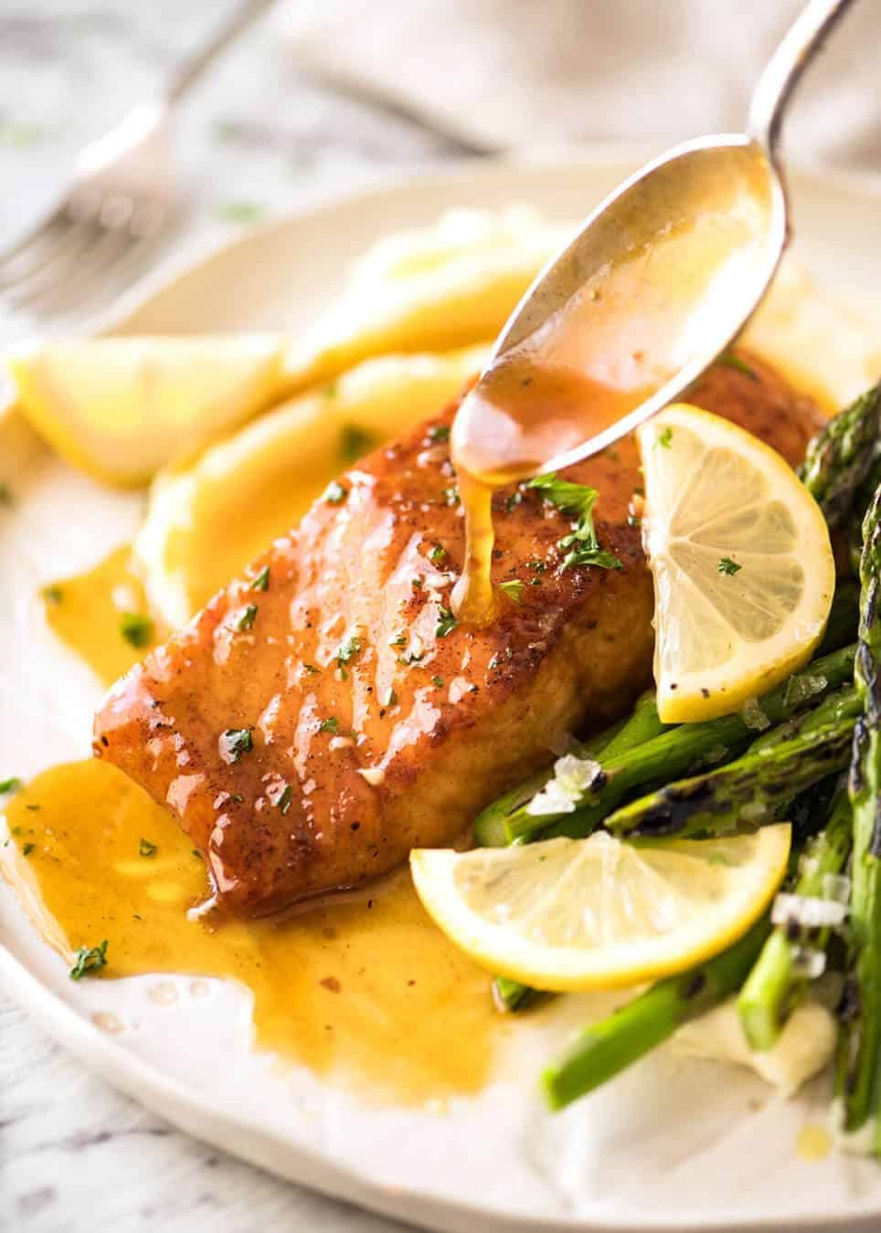 If this Lemon Honey Glazed Salmon takes more than 8 minutes to make, you've overcooked the salmon. That sauce is lip smackingly delicious! staging.recipetineats.com