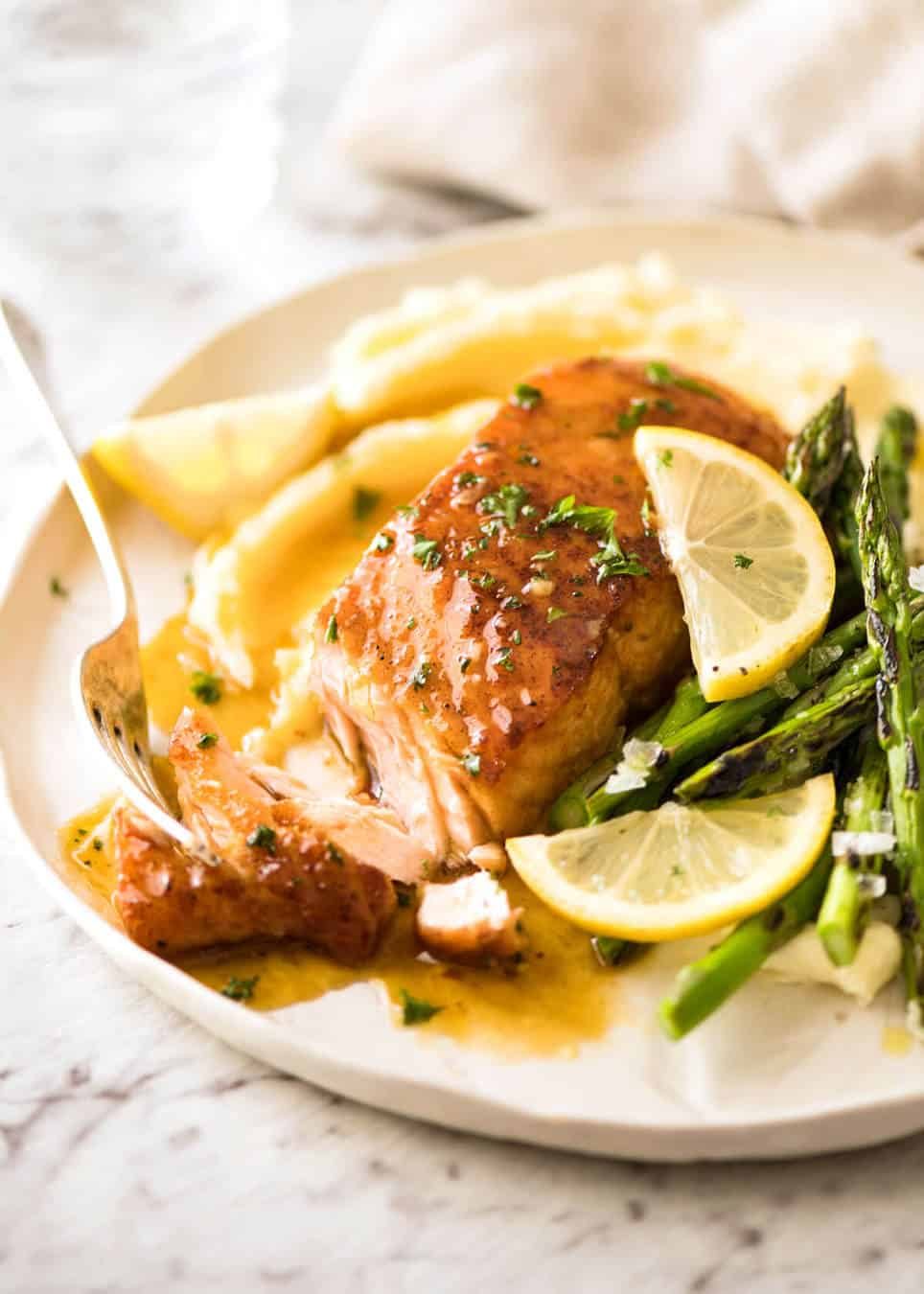If this Lemon Honey Glazed Salmon takes more than 8 minutes to make, you've overcooked the salmon. That sauce is lip smackingly delicious! staging.recipetineats.com